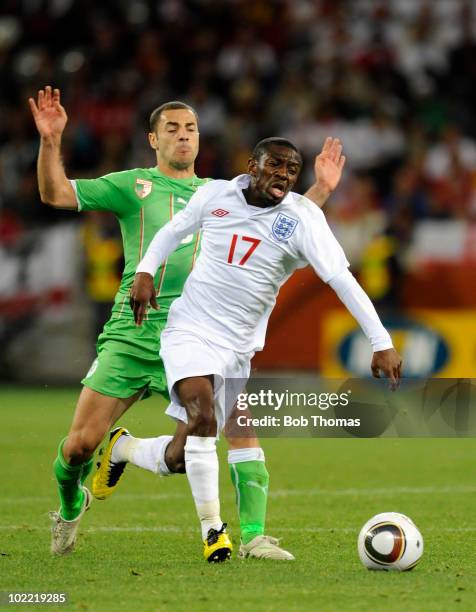 Medhi Lacen of Algeria challenges Shaun Wright-Phillips of England during the 2010 FIFA World Cup South Africa Group C match between England and...