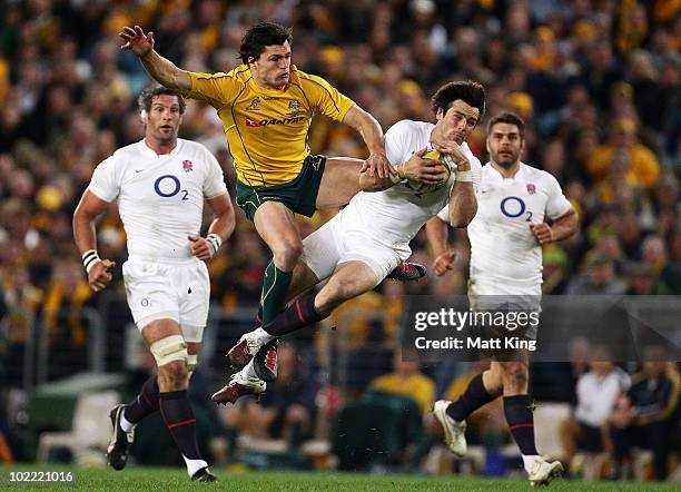 Ben Foden of England takes a high ball in front of Adam Ashley-Cooper of the Wallabies during the Cook Cup Test Match between the Australian...