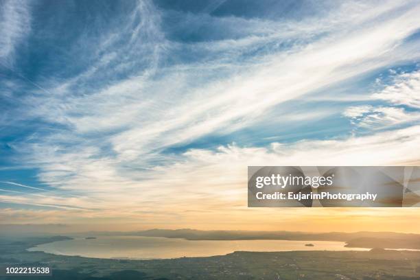 sunset on the lake biwa seen from mount ibuki - omi stock pictures, royalty-free photos & images