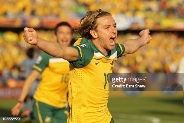 Brett Holman of Australia celebrates after scoring the opening goal during the 2010 FIFA World Cup South Africa Group D match between Ghana and...