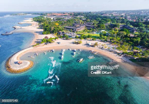 bali coast with a figurative breakwater aerial view - nusa dua stock pictures, royalty-free photos & images