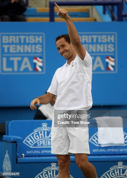 Michael Llodra of France celebrates after winning the Final against Guillermo Garcia-Lopez of Spain during day six of the AEGON International at...