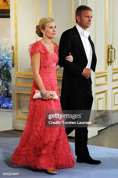 Anna Westling Blom, sister of the groom, and partner Mikael Soederstroem attend the wedding ceremony between Crown Princess Victoria of Sweden and...