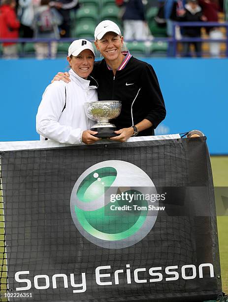 Lisa Raymond of USA and Rennae Stubbs of Australia pose with the trophy after winning the womens doubles during day six of the AEGON International at...