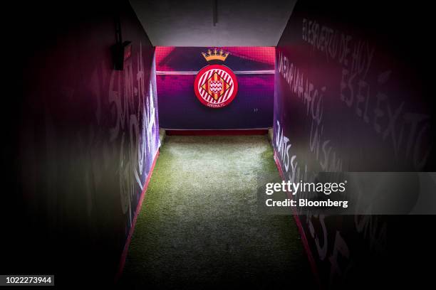 The Girona FC club crest stands inside the player tunnel at Estadi Montilivi, home stadium of Girona Futbol Club S.A.D., in Girona, Spain, on...