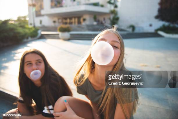 teenage friends - bubble gum stock pictures, royalty-free photos & images