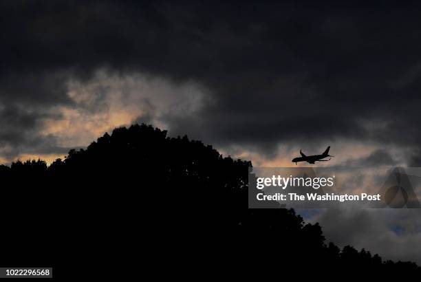 The plane carrying President Trump is about to be out of view as it passes a mountain as the plane was on final approach to Yeager Airport, a...
