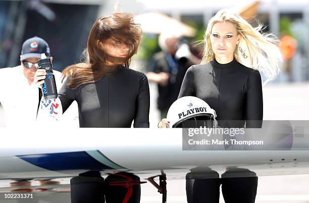 Dolderer Matthias of Germany heads towards the runway with his playboy girls at the Race Airport during the Red Bull Air Race New York Qualifying Day...