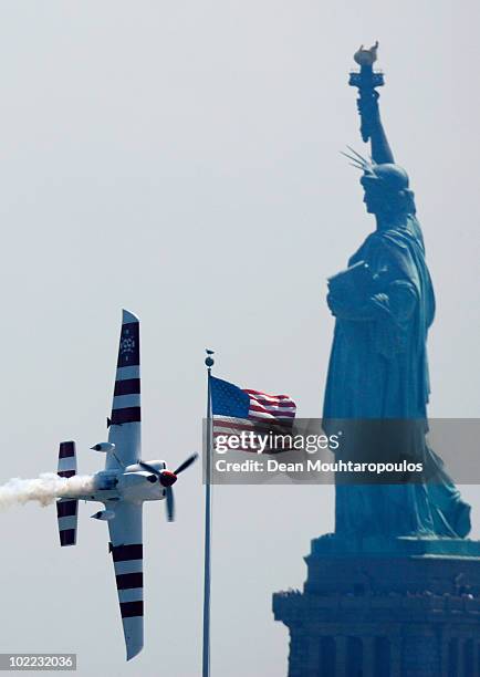 Paul Bonhomme of Great Britain in action on the Hudson River during the Red Bull Air Race New York Qualifying Day on June 19, 2010 in New Jersey.