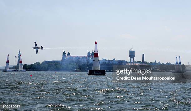Paul Bonhomme of Great Britain in action on the Hudson River during the Red Bull Air Race New York Qualifying Day on June 19, 2010 in New Jersey.
