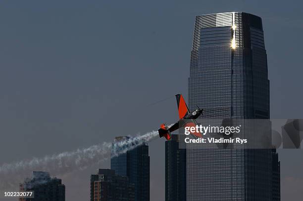 Nicolas Ivanoff of France in action on the Hudson River during the Red Bull Air Race New York Qualifying Day on June 19, 2010 in New Jersey.