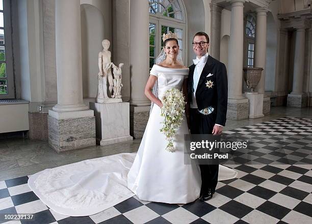 Crown Princess Victoria of Sweden and Prince Daniel, Duke of Vastergotland pose after their wedding in Storkyrkan Church on June 19, 2010 in...