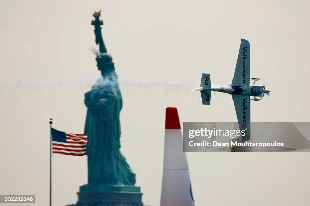 Matthias Dolderer of Germany in action on the Hudson River during the Red Bull Air Race New York Qualifying Day on June 19, 2010 in New Jersey.