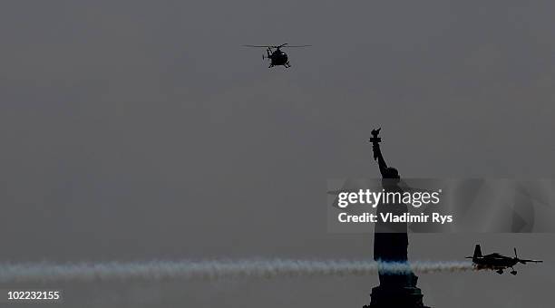 Kirby Chambliss of USA in action on the Hudson River during the Red Bull Air Race New York Qualifying Day on June 19, 2010 in New Jersey.