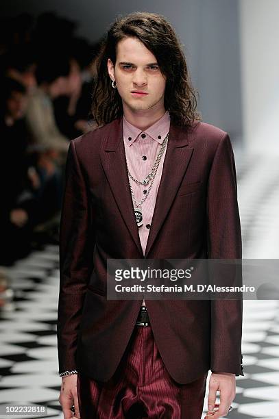 Model Jethro Lazenby Cave walks the runway during the Versace Milan Menswear Spring/Summer 2011 show on June 19, 2010 in Milan, Italy.