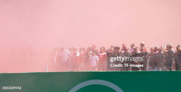 Supporters of Fortuna Duesseldorf are firing Bengalos during the DFB Cup first round match between TuS RW Koblenz and Fortuna Duesseldorf at Stadion...