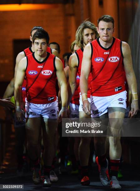 Brendon Goddard of the Bombers leads his team out during the round 23 AFL match between Port Adelaide Power and the Essendon Bombers at Adelaide Oval...