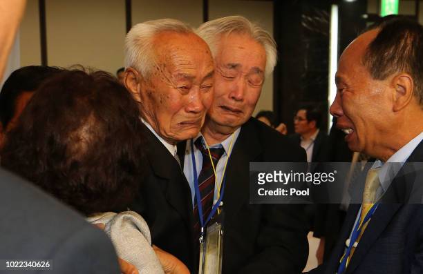 North Korean Cho Duk-Yong, 88 meet his South Korean brother Cho Sang-Yong, 80 during a separated family reunion meeting at the Mount Kumgang resort...