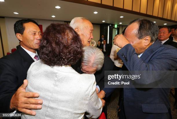 North Korean Cho Duk-Yong, 88 meet his South Korean brother Cho Sang-Yong, 80 during a separated family reunion meeting at the Mount Kumgang resort...