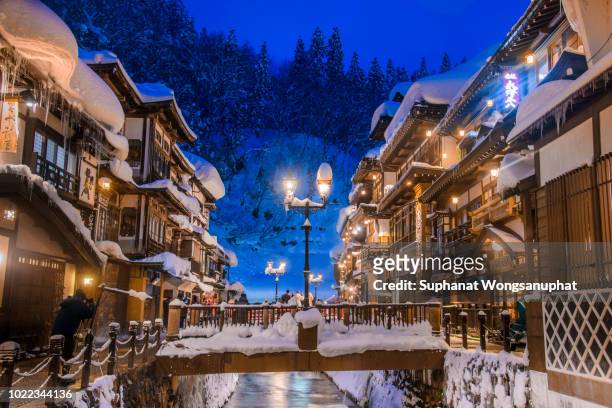 ginzan onsen during winter - hot spring stock pictures, royalty-free photos & images