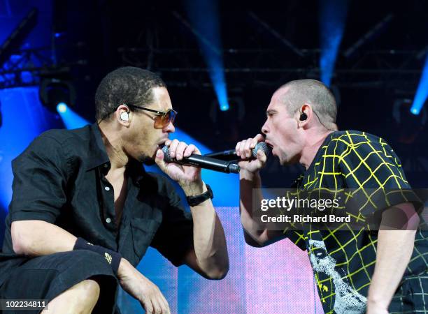 Joey Starr and Kool Shen of French Rap band NTM, perform live on stage at Parc des Princes on June 19, 2010 in Paris, France.