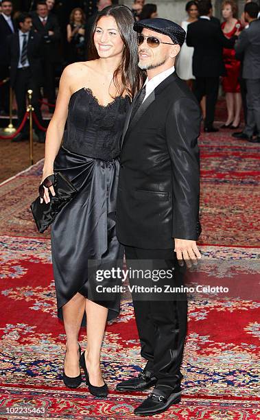 Marica Pellegrini and Eros Ramazzotti attend the Dolce & Gabbana "20 Years of Menswear" during Milan Fashion Week Spring/Summer 2011 on June 19, 2010...