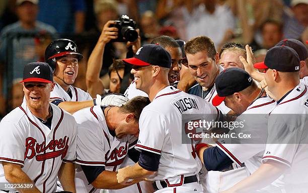 Troy Glaus of the Atlanta Braves celebrates his walk-off homer in the ninth inning to give the Braves a 5-4 win over the Kansas City Royals at Turner...