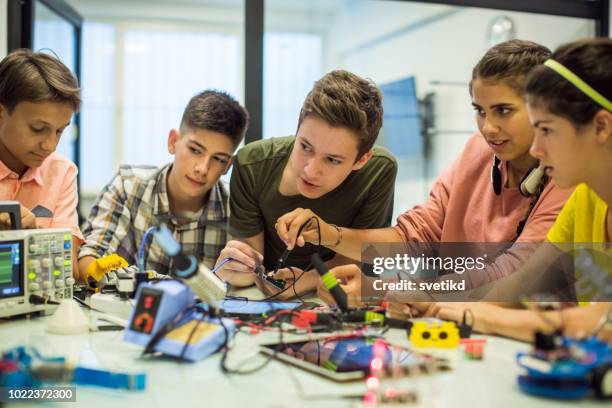 lerning to work in group - summer camp stock pictures, royalty-free photos & images