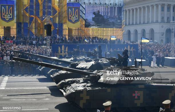 Ukrainian tanks rumble on Kiev central street during a military parade on August 24 to celebrate the Independence Day, 27 years since Ukraine gained...