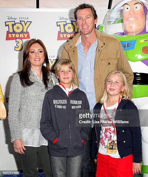 Sara Leonardi, Glenn McGrath and his children James McGrath and Holly McGrath arrive for the premiere of "Toy Story 3" at IMAX Darling Harbour on...
