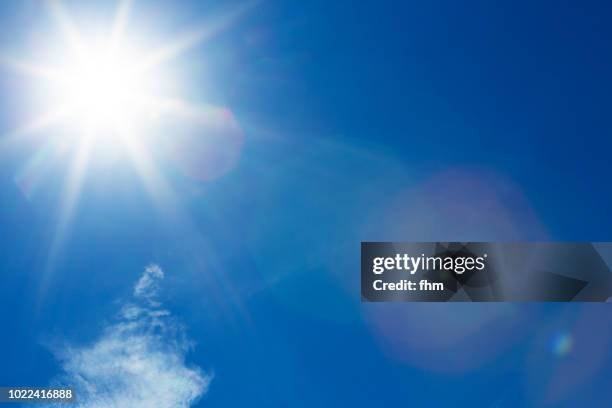 full bright sun in the sky - sonne himmel stock-fotos und bilder