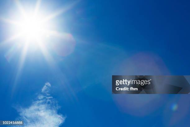full bright sun in the sky - soleggiato foto e immagini stock