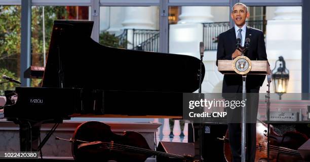 American politician US President Barack Obama speaks from the stage during the International Jazz Day Concert on the South Lawn of the White House,...