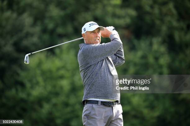 Mike Harwood of Australia in action during Day One of The Willow Senior Golf Classic played at Hanbury Manor Marriott Hotel and Country Club on...