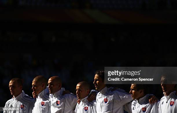 The Slovakia team line up for the national anthems prior to the 2010 FIFA World Cup South Africa Group F match between Slovakia and Paraguay at the...
