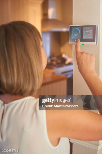 home energy costings - electricity meter stock pictures, royalty-free photos & images