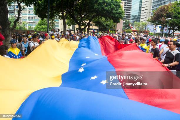 venezuelan flag - venezuela flag stock pictures, royalty-free photos & images