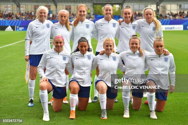 England's squad pose prior to the Women's U20 World Cup play-off for third place football match between France and England on August 24 at the La...