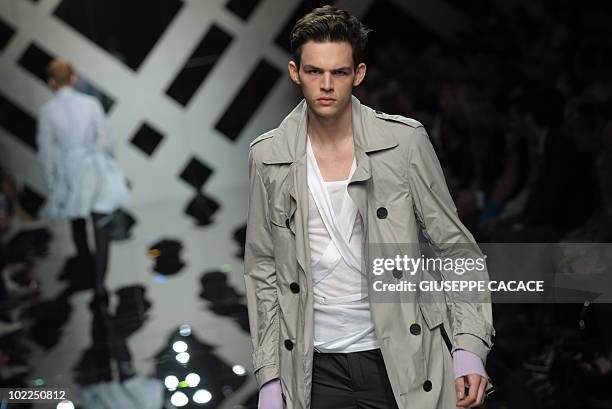 French model Tom Nicon presents a creation as part of Burberry Prorsum Spring-Summer 2010 Menswear collection on June 20, 2009 during the Men's...