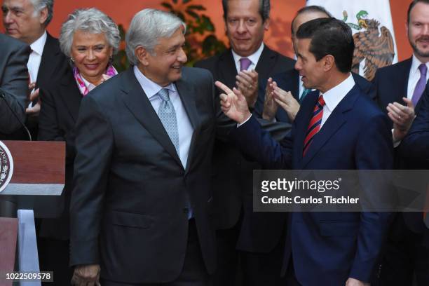 President Elect Andres Manuel Lopez Obrador and President of Mexico Enrique Peña Nieto talk after a press conference at Palacio Nacional on August...
