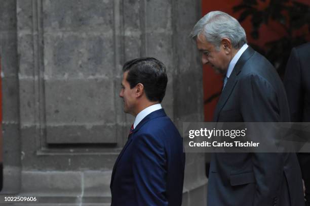 President Elect Andres Manuel Lopez Obrador and President of Mexico Enrique Peña Nieto look on after a press conference at Palacio Nacional on August...