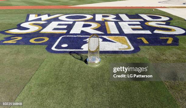 The Commissioners trophy is seen on the field before Game 7 of the 2017 World Series between the Houston Astros and the Los Angeles Dodgers at Dodger...