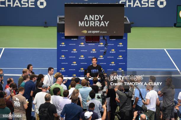 Andy Murray of Great Britain talks to the press during the US Open media availability on August 24 in the new Louis Armstrong Stadium at the USTA...