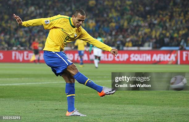 Luis Fabiano of Brazil scores the opening goal during the 2010 FIFA World Cup South Africa Group G match between Brazil and Ivory Coast at Soccer...