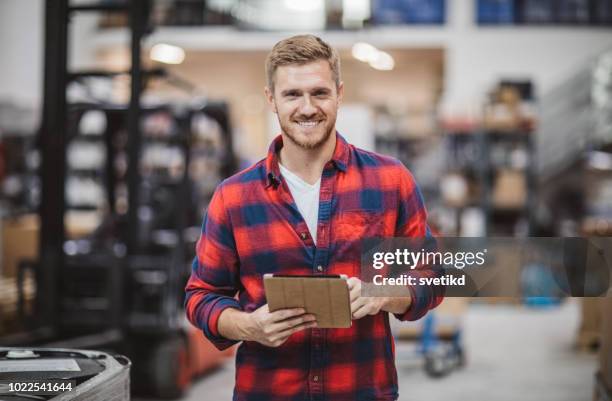 warehouse workers - man wearing plaid shirt stock pictures, royalty-free photos & images