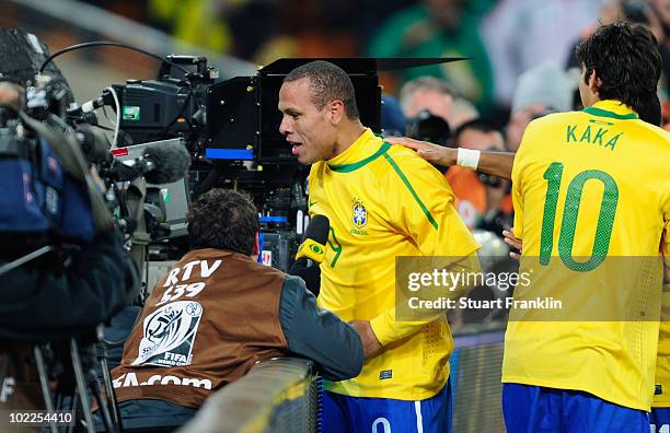 Luis Fabiano of Brazil celebrates scoring his second goal during the 2010 FIFA World Cup South Africa Group G match between Brazil and Ivory Coast at...