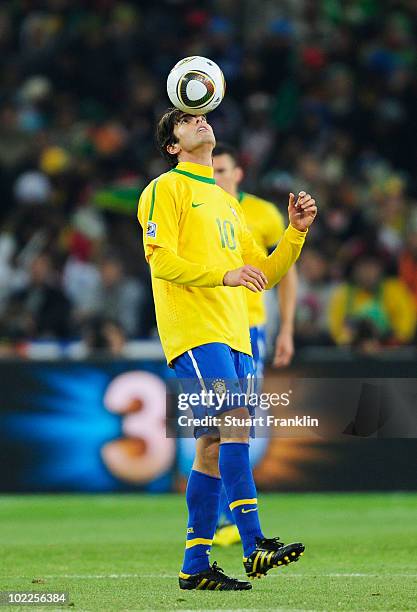 Kaka of Brazil balances the ball on his head during the 2010 FIFA World Cup South Africa Group G match between Brazil and Ivory Coast at Soccer City...