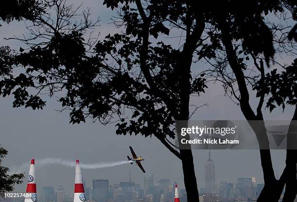Kirby Chambliss of USA in action on the Hudson River during the Red Bull Air Race New York Race Day on June 20, 2010 in New Jersey.