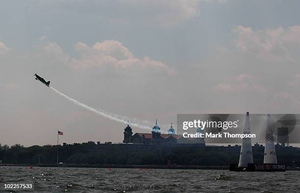 Michael Goulian of USA in action on the Hudson River during the Red Bull Air Race New York Race Day on June 20, 2010 in New Jersey.