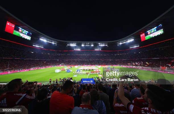 General view as mascots, players and officials line up prior to the Bundesliga match between FC Bayern Muenchen and TSG 1899 Hoffenheim at Allianz...